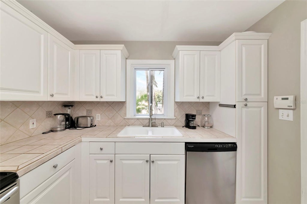 Photo of 1712 Siesta Drive, Sarasota, FL 34239 (MLS # A4705310)