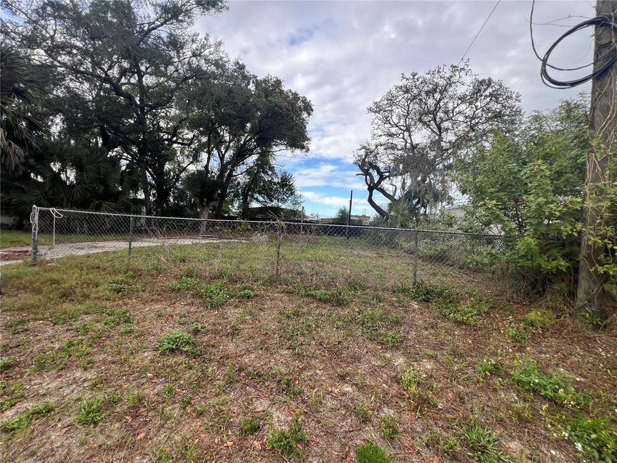 LOOKING FOR A PIECE OF LAND TO PUT A TINY HOME, MOBILE HOME ON, NO HOA, NO FLOOD, PRIOR MOBLE HOME HAD BEEN REMOVED SO LOT HAS POWER POLE AND SHOULD HAVE PUBLIC WATER AND SEWER TO HOOK UP TO. THERE IS A CONCRETE SLAB THAT WAS THE DRIVE WAY STILL THERE, FENCED. CENTRALLY LOCATED TO SHOPS, RESTRAUNTS, BEACHES AND DOWNTOWN NEW PORT RICHEY.