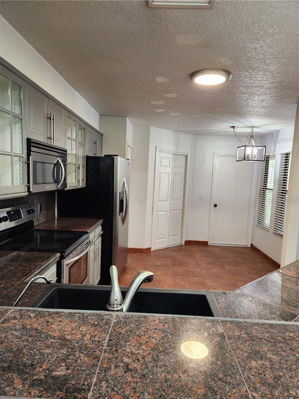 Photo of 7209 Dr Phillips Boulevard, Orlando, FL 32819 (MLS # O6375678)