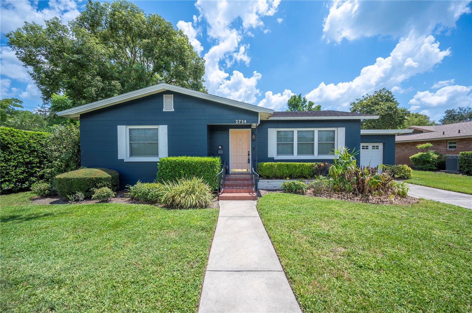 Welcome to this beautifully maintained and charmingly updated 3-bedroom, 2 bath home nestled in the heart of Central
Lakeland. Venture inside to find original hardwood floors that seamlessly throughout the home and compliment the
historic character of the curved ceilings. The kitchen has been tastefully updated with marble-look formica countertops,
classic subway tile backsplash, floating shelves, and a full suite of appliances—including a dishwasher! The spacious
primary bedroom features a fully renovated en-suite bathroom (2021), a rare find among historic homes. The newer A/C
system (2021) ensures comfort and peace of mind for years to come. Outside, enjoy a fully fenced backyard—ideal for
pets, play, or relaxing evenings. Other updates include fresh interior paint throughout (July 2025), and a new garage
door motor and openers (2025). This home is perfectly situated just minutes from some of Lakeland’s most beloved
spots: Lake Hollingsworth, Cleveland Heights Golf Course, Common Ground Park, and the public tennis courts, offering
plenty of options for outdoor recreation and community enjoyment. Don’t miss your chance to own this move-in-ready
gem in one of Lakeland’s most desirable locations!