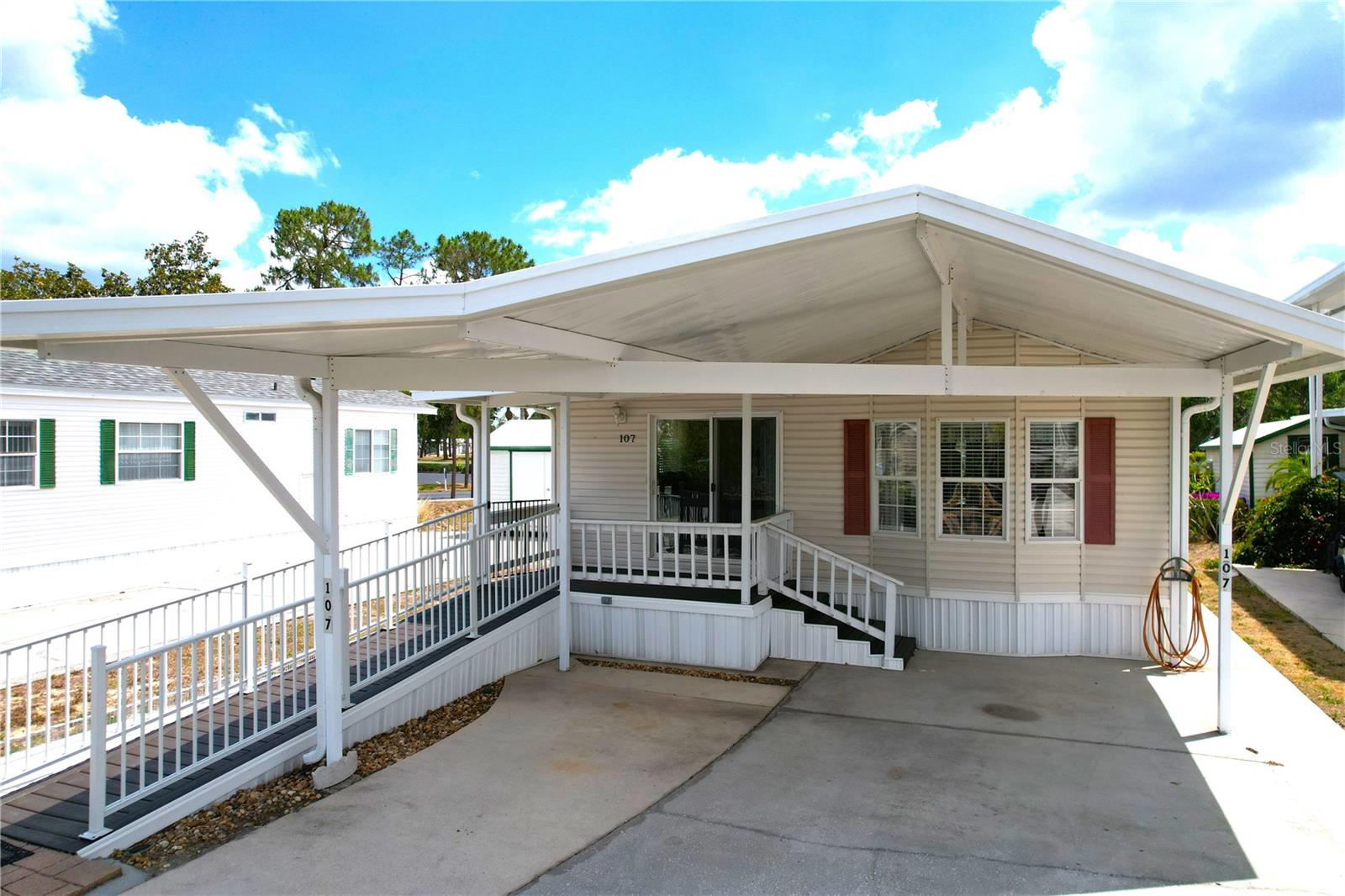 Welcome to DEER CREEK RV GOLF & COUNTRY CLUB! It’s the perfect time to purchase your new FLORIDA GETAWAY! Whether you are looking for a sunny place to winter or a full-time residency, this one-bedroom, plus bonus room for an office or guest room, two-bath, well-maintained park model is perfect! Conveniently located by the entrance of Deer Creek in Osprey Point! Home boasts an open floor plan with living, kitchen & dining room! Many updates with a new roof, tile flooring throughout & Trex decking! The large, covered patio/carport is a great place for entertaining with family & friends! Nice walkway/ramp is in place making easy access! There’s plenty of covered parking for your cars & golf carts plus a shed off the back for storing your golf clubs & toys! Laundry room is also in the shed! All furniture & furnishings area included in the sale! Move in ready! You’ll love sipping your coffee or reading your favorite book under the covered front porch area! The Osprey Point Community Clubhouse, Pool, Hot Tub, Shuffleboard Courts & many activities are just a golf cart ride away! If you love RESORT style living, this is the place for you! Deer Creek Community also has a MAIN CLUBHOUSE offering a variety of social events throughout the year such as Karaoke, Trivia, Cardio Drumming, Line Dancing, Crafts, Swing Dancing & more! Soak up the sun at Deer Creek’s MAIN pool, cabana & hot tub area! Try water volleyball, pickleball, tennis, shuffleboard or pool aerobics! Love golfing? Check out Deer Creek’s 18 Hole Executive Golf Course Leagues & shopping at the Pro Shop! The Tiki Bar is a great place to meet new friends with occasional live bands & music! The Greenside Grill is perfect for onsite dining! Deer Creek is centrally located in Davenport just 20 minutes from Disney & all the attractions that families enjoy! Hop on your golf cart & ride to many restaurants & shops nearby. Bealls, Marshalls, Target & Star Bucks are in Posner Park less than a mile away! Call today to view this HIDDEN GEM in sunny Florida! Just 1.5 hours to each COAST! Looking for a slice of paradise? Let us show you Deer Creek today!