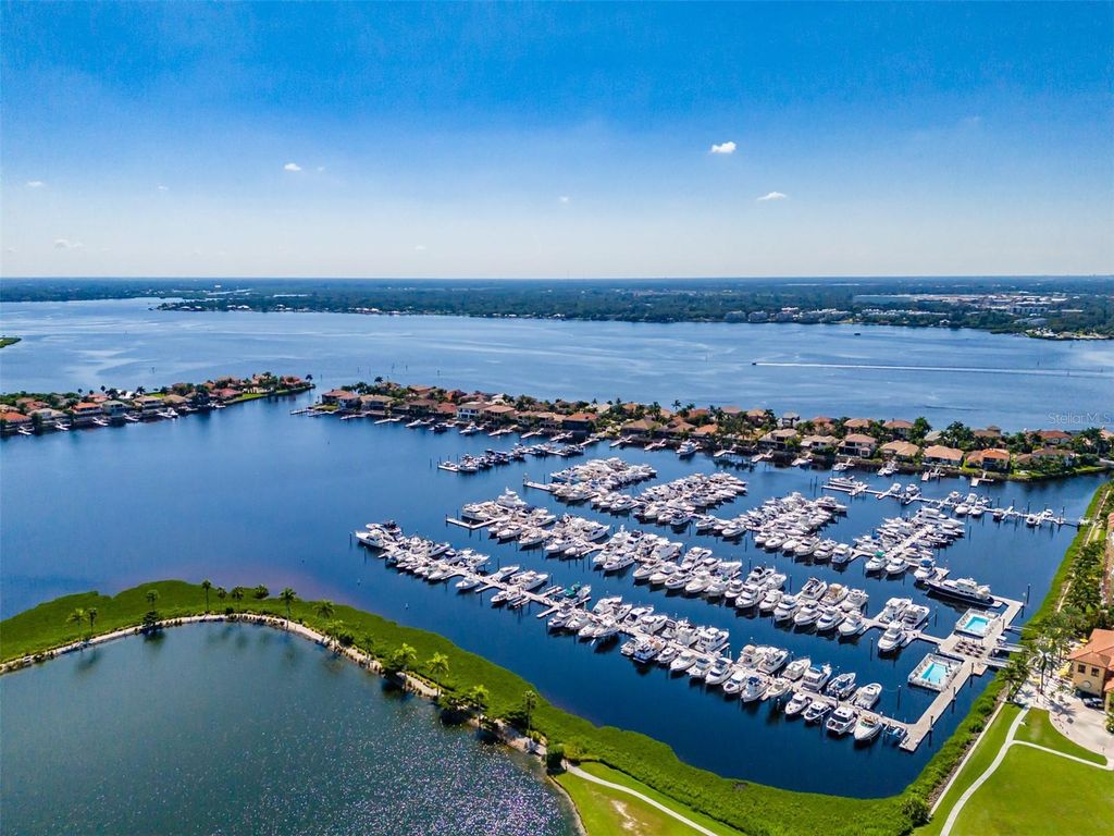 Photo of 130 Riviera Dunes Way #304, Palmetto, FL 34221 (MLS # A4663442)