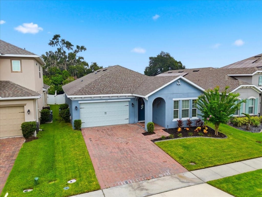 Photo of 4791 Riverwalk Drive, Saint Cloud, FL 34771 (MLS # O6430911)