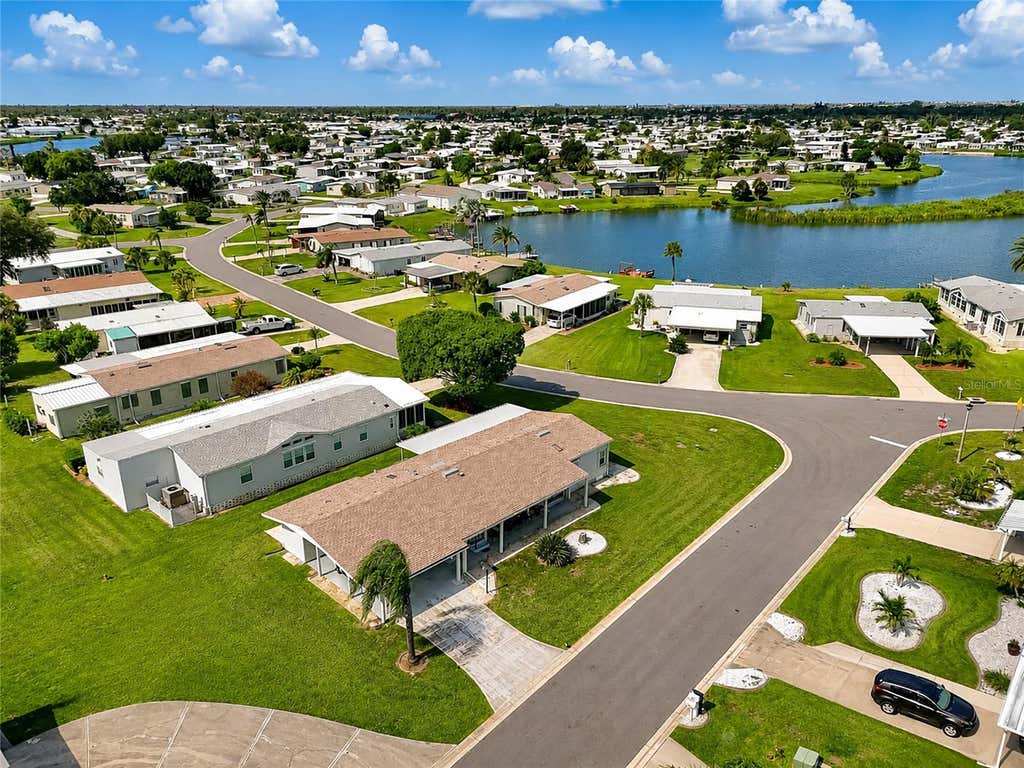 Photo of 6041 Toucan Drive, Englewood, FL 34224 (MLS # A4703220)