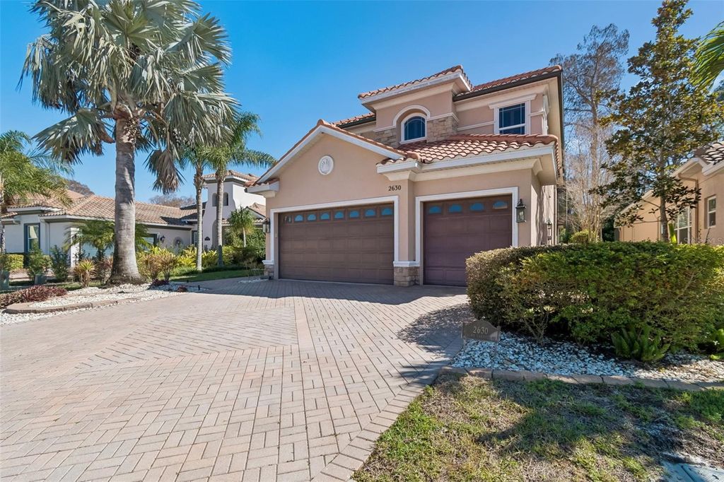 Photo of 2630 Grand Lakeside Drive, Palm Harbor, FL 34684 (MLS # TB8480712)