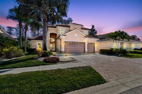 Photo of 2630 Grand Lakeside Drive, Palm Harbor, FL 34684 (MLS # TB8480712)