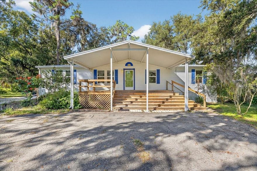 Charming Country Retreat on Nearly an Acre!  Welcome home to this well maintained 2001 manufactured home offering 3 bedrooms, 2 baths, and 1,512 sq. ft. of comfortable living space. Nestled on almost an acre of peaceful land, this property provides plenty of room to relax, play, and enjoy the outdoors. You’ll love spending time on the inviting front porch, perfect for morning coffee, and the large, enclosed back porch, ideal for year-round enjoyment of the serene surroundings. Inside, you’ll find a freshly painted interior with a split floor plan for added privacy, a spacious kitchen and dining area, both a living room and family room and a convenient inside laundry room. Recent updates include newer windows and a durable metal roof, offering peace of mind and energy efficiency. Step outside to enjoy the expansive front and back yards, perfect for gardening, gatherings, or simply soaking in the tranquility of country living — all while being just a short drive to town amenities.
This property combines the best of both worlds — quiet country charm and modern comfort. Don’t miss your chance to make it yours!