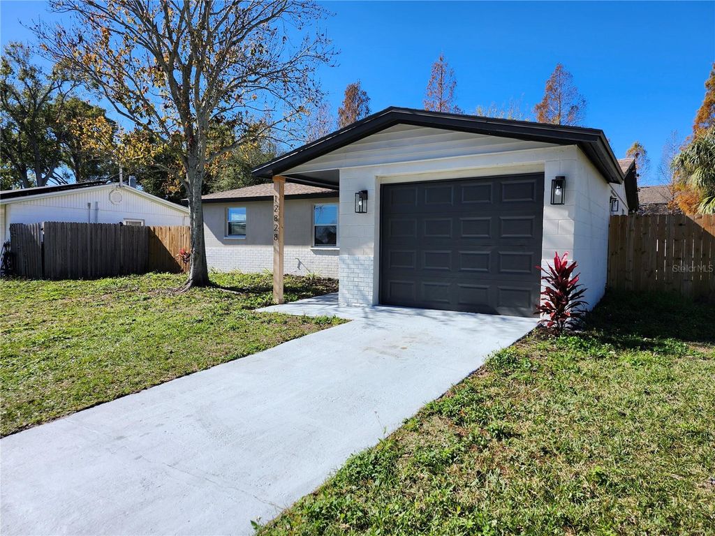 Photo of 12828 103rd Way, Largo, FL 33773 (MLS # TB8465810)