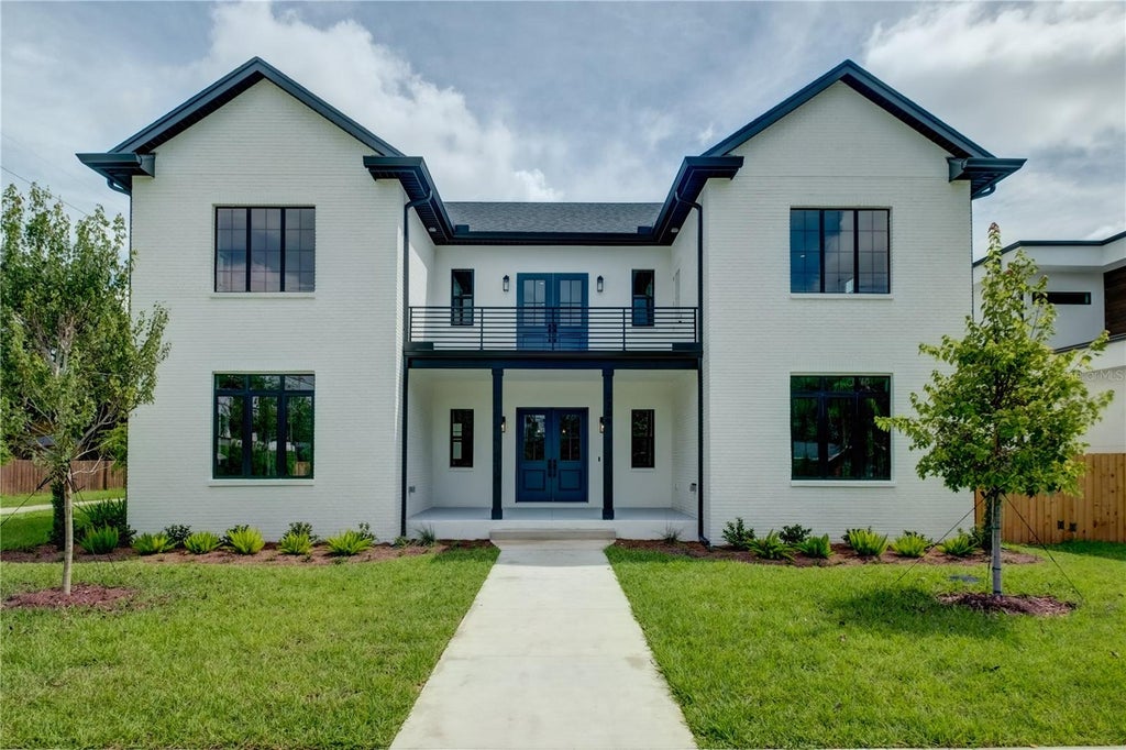 Photo of 805 W Indiana Avenue, Tampa, FL 33603 (MLS # TB8522276)