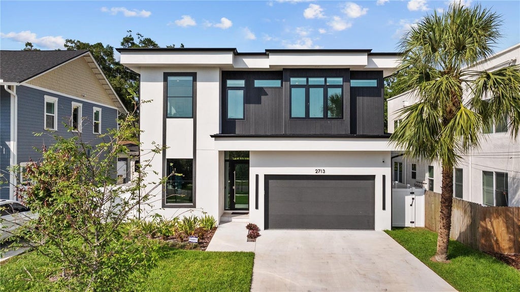 Photo of 805 W Indiana Avenue, Tampa, FL 33603 (MLS # TB8522276)