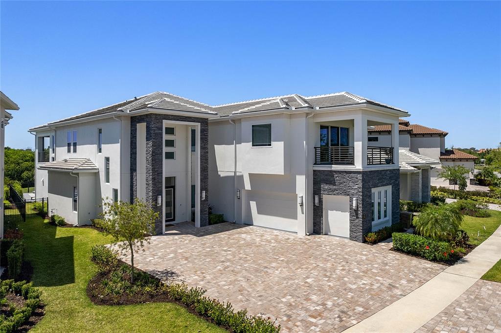 This is a phenomenal opportunity inside our exclusive Bear's Den subdivision! This beautiful residential home will make an easy transition for HIGH RENTAL INCOME in one of the most sought after areas in Reunion. This 8BR CUSTOM BUILD has everything you need for success. 3 Bedrooms downstairs and 5 up accompanied by a perfectly situated & dedicated MOVIE THEATER and MEDIA ROOM. The lot is exquisite if you like never ending SUNSETS and a fantastic covered lanai with a fully equipped outdoor kitchen and lounge area. FULLY FURNISHED with TRANSFERRABLE MEMBERSHIP and an added bonus with a GOLF CART GARAGE and numerous UPGRADES makes this home a must see for anyone looking to live in Reunion or rent out the home for maximum profit. Begin the day from your Media Room from a dedicated balcony and watch the Sunrise over Disney! Enjoy the day as you swim in the pool or lounge in the GREAT ROOM or have a dinner in the dining room with its 25'ceiling area open to the second floor or finish the day as you gaze out over the incredible back drop of the 18th hole on Reunion's Signature Nicklaus golf course all from the spectacular second level balcony. It's only a short walk away from the Dining, Fitness area, or Practice facilities of the Nicklaus Traditions Clubhouse for convenience. There isn't anything this home lacks! Come and see a perfect home in a perfect area and live out your dream at Reunion Resort. Call today to schedule a showing. Room Feature: Linen Closet In Bath (Primary Bedroom).