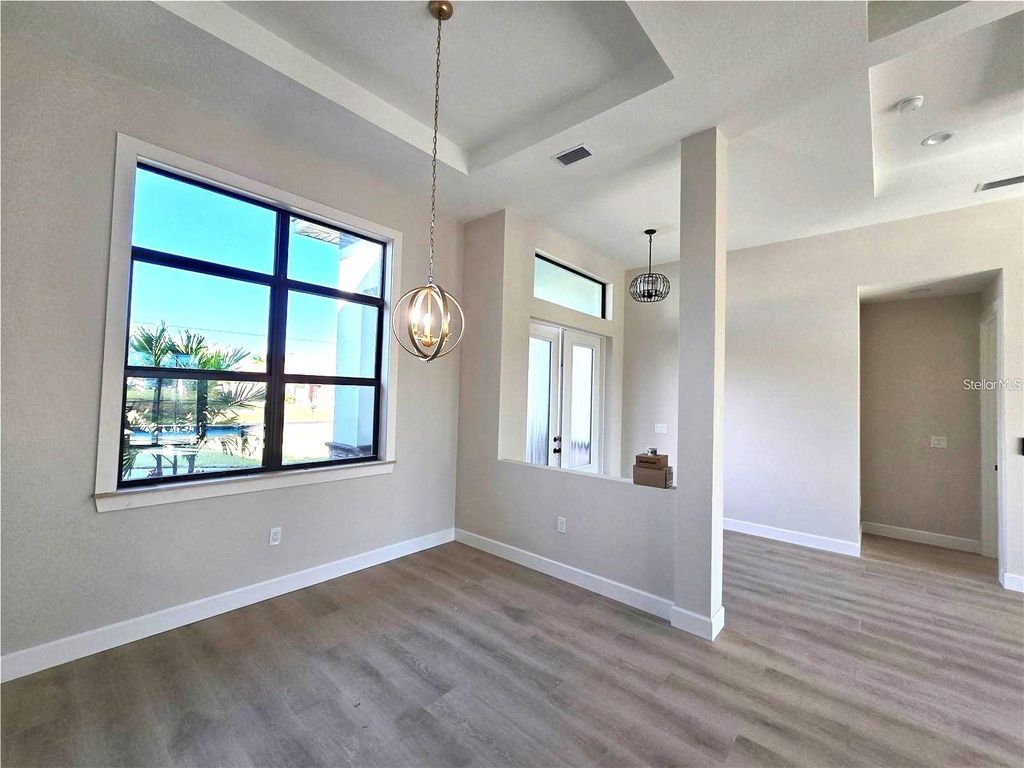 Photo of 703 Boundary Boulevard, Rotonda West, FL 33947 (MLS # D6146331)