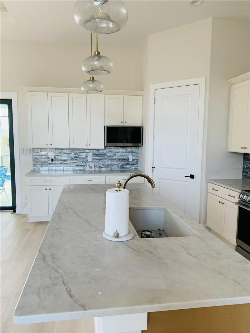 Photo of 703 Boundary Boulevard, Rotonda West, FL 33947 (MLS # D6146331)