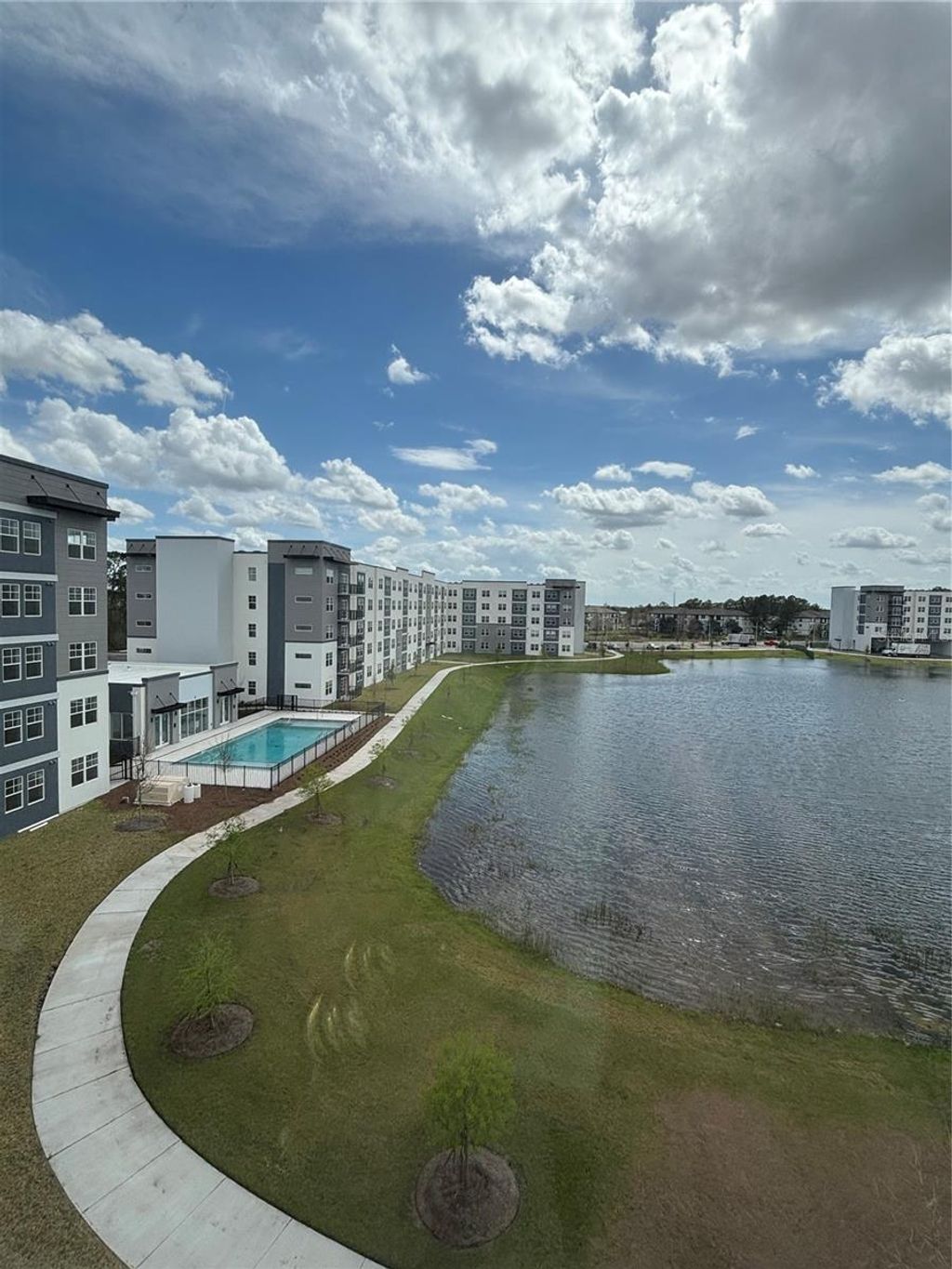Photo of 5579 Millenia Park Blvd #517, Orlando, FL 32839 (MLS # O6394181)