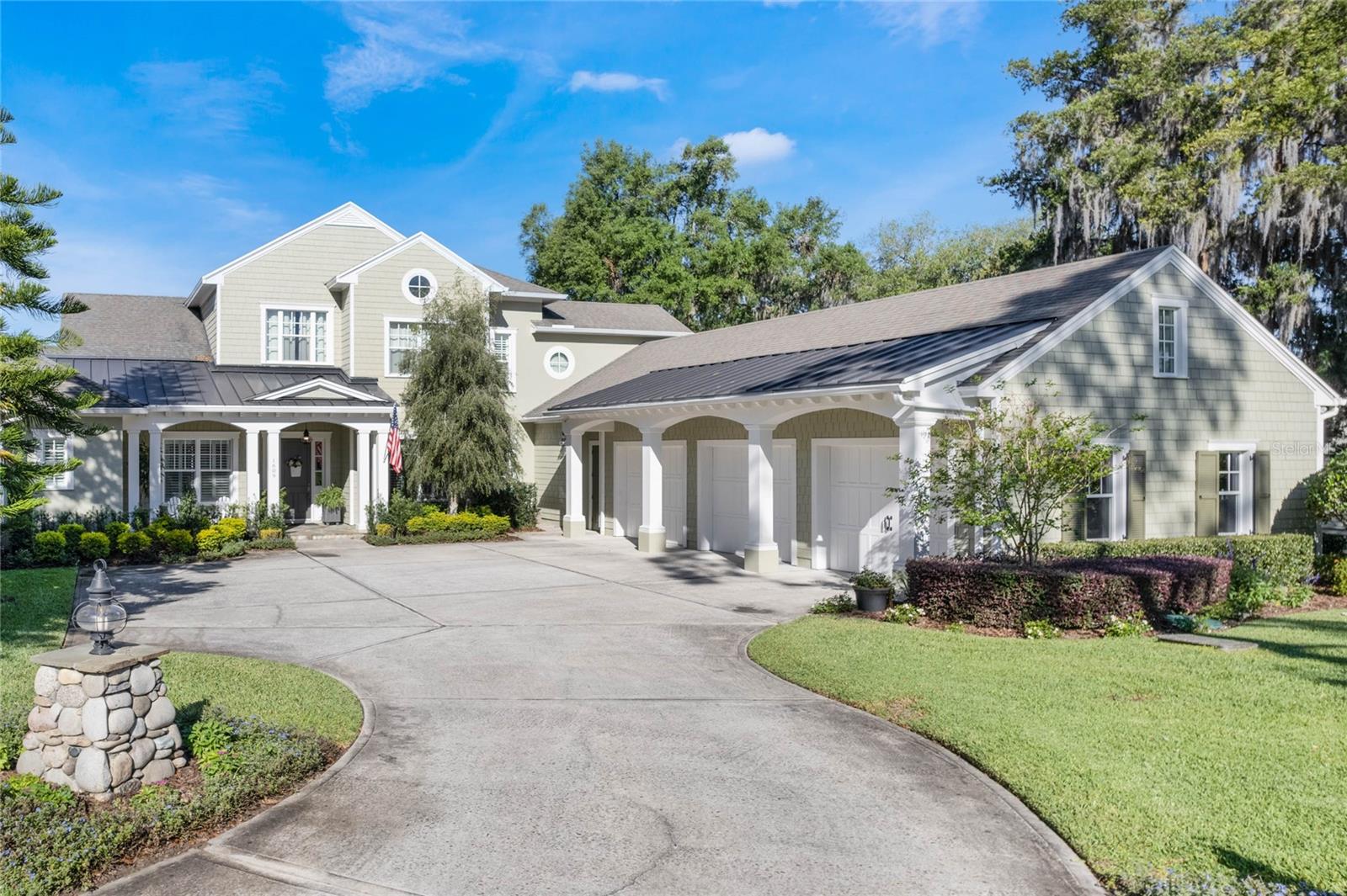 Amazing custom build with a spacious yard and beautiful lake views. This home offers all of the custom upgrades from central vacuum, crown molding, timeless tiled baths and an expansive back covered back porch. The home offers 5 bedrooms and 5 baths. From the second you enter the spacious foyer your eyes float over the dining room to the bank of french doors over looking the pool and lake. There is a formal living room as you enter the home perfect for those small quiet conversations with friends and neighbors. The master bedroom is on the first floor and over looks the pool and lake. The master bathroom over flows with storage, a private water closet, beautiful stand alone tub and and walk in shower. There is another bedroom, currently used for an office, and bath on this side of the home. The wood floors flow throughout the main living area. The kitchen is bright and light with an island, bar area with seating and an eat in nook area. Storage for paperwork is conveniently located at your built in desk. The family room is right off the kitchen and boasts a beautiful rock and wood planked fireplace. Off the back wing is a 3rd area for a playroom, in law suite, study room or music room. Great Flex space!! Upstairs you will find a loft, 3 bedrooms and 2 baths. The pool has a spa and the home will have a brand new roof. The back porch and exterior dining, living and outdoor kitchen are spacious and well covered. The pool is also a custom build.