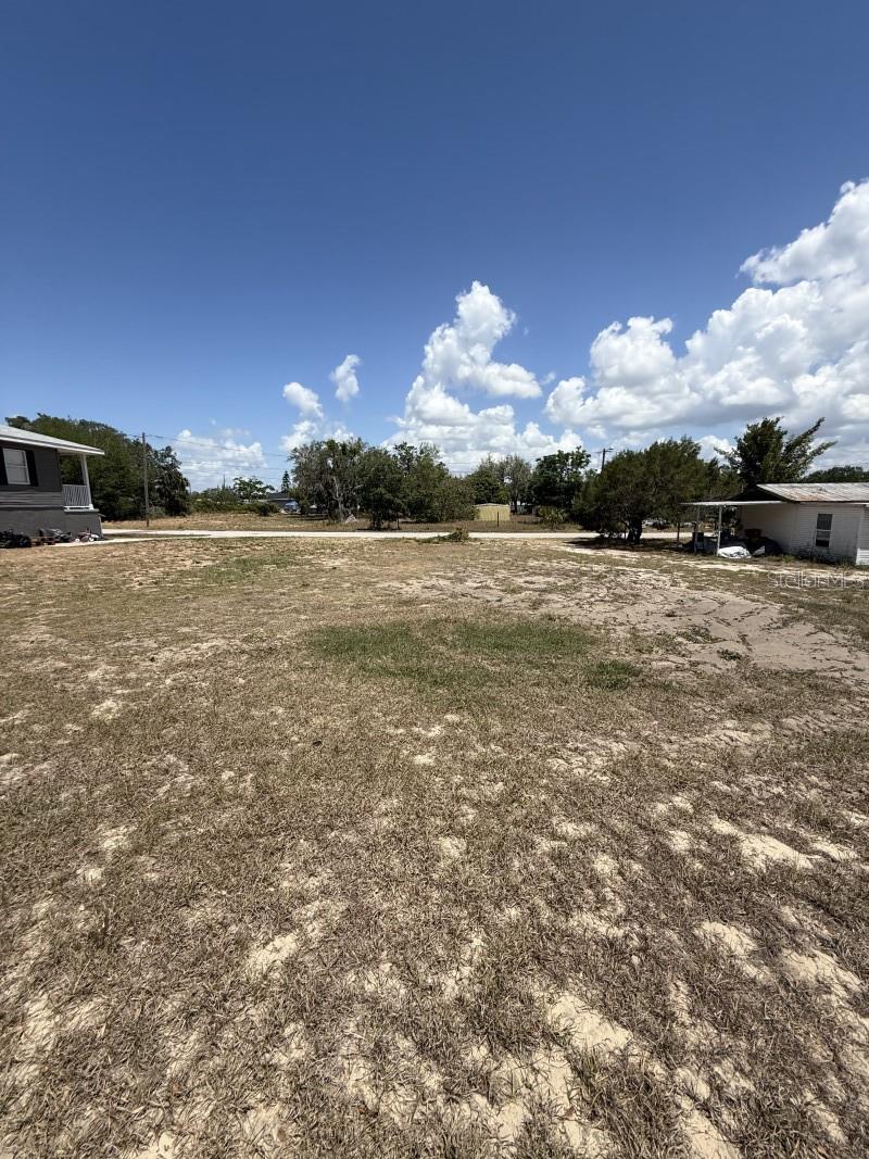 Calling all investors & builders! Unlock the potential of this unique property sitting on four contiguous lots—an unrivaled development opportunity in Frostproof. The existing home is fully connected to city sewer and water, allowing you to avoid some impact fees and start adding value immediately.Rehab the cozy bungalow, capitalize on rental income or resale value, then subdivide and sell the remaining lots individually.
Option 2: Tear down the house entirely and build up to four new homes—each on its own parcel—to maximize ROI.