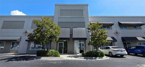 Photo of 7810 Kingspointe Parkway #4, Orlando, FL 32819 (MLS # O6433471)
