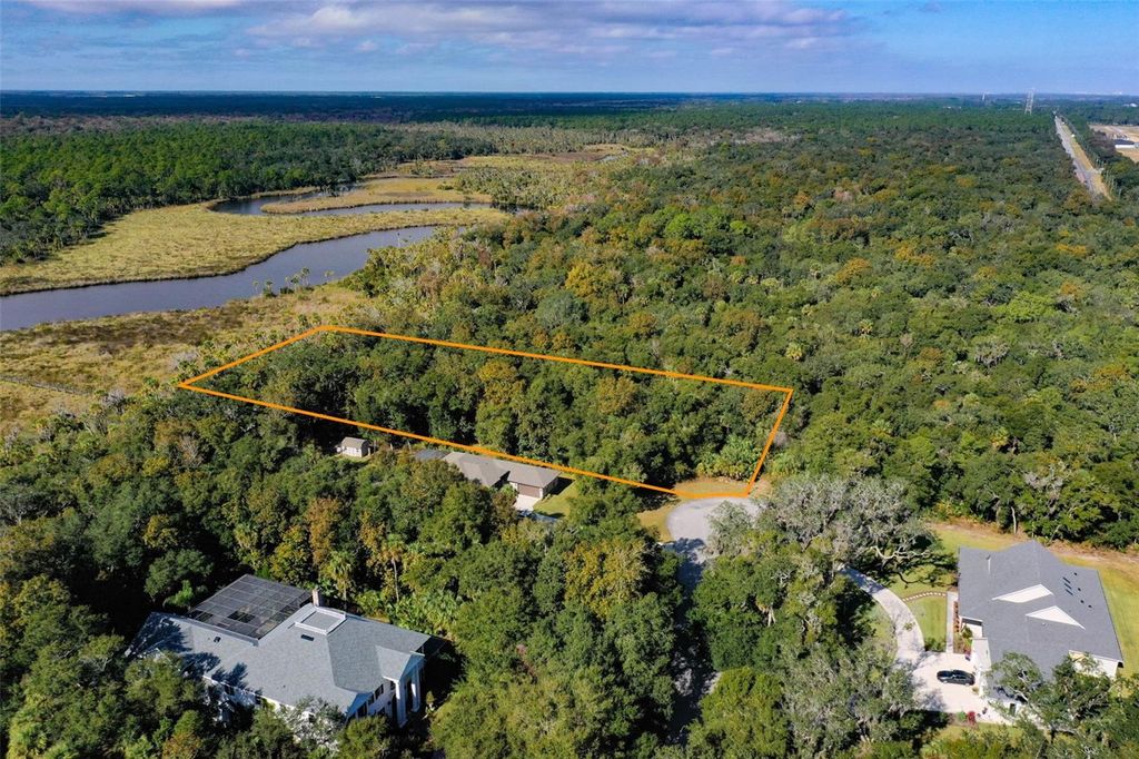 Photo of 105 Bridle Ridge Court, Flagler Beach, FL 32136 (MLS # FC314378)