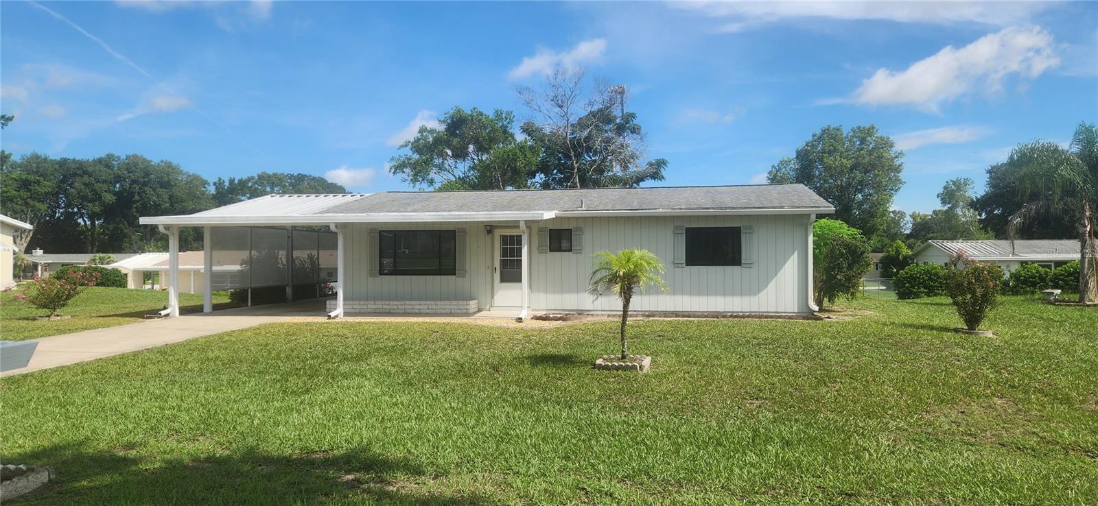 Spruce model in Pine Run. Home features Two good size Bedroom's with walk in closets, and Two Bath's, plus Spacious Living Room, and good size Dining Room. Home also features a very large 14X11 glass enclosed Family/Florida room larger then the Living Room,with it's own New AC unit that was built level with the rest of the home. Brand New LVP in Living Room, Dining Room,Hallway, plus both Bedrooms and closets. Kitchen and boths Bathrooms Feature Tile. Roof and AC replaced in 2014. Your new home also features a Private Backyard with pleanty of room to add Fencing for your Pups. Utility room is oversized at 12x8, and Water Heater is 2019. SELLER FINANCING AVAILABLE WITH $30,000.00 DOWN, 5.5% INTEREST @ 20 YEARS. Seller will look at all offers!