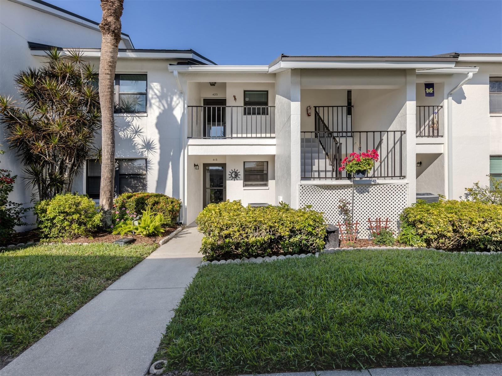 This updated condo offers stunning views of a lake and golf course, complete with turnkey furnishings for a seamless move-in. The kitchen and bathrooms have been stylishly renovated, including flooring, a Euro-style Bosch washer and dryer, and recently replaced windows and roof. Both bathrooms include step-in showers with designer tile and multiple head faucets. Ample storage is available with walk-in closets and a linen closet. The kitchen boasts granite counters and plenty of cupboard space. The HVAC system includes a built-in humidistat. Each unit has its own storage space on-site. The Lakes of Capri is an exceptionally well-managed community, with friendly residents, a large pool, updated clubhouse to enjoy, manicured grounds, and newer carports. Adding to the benefits here, the association fees have actually been reduced lately.