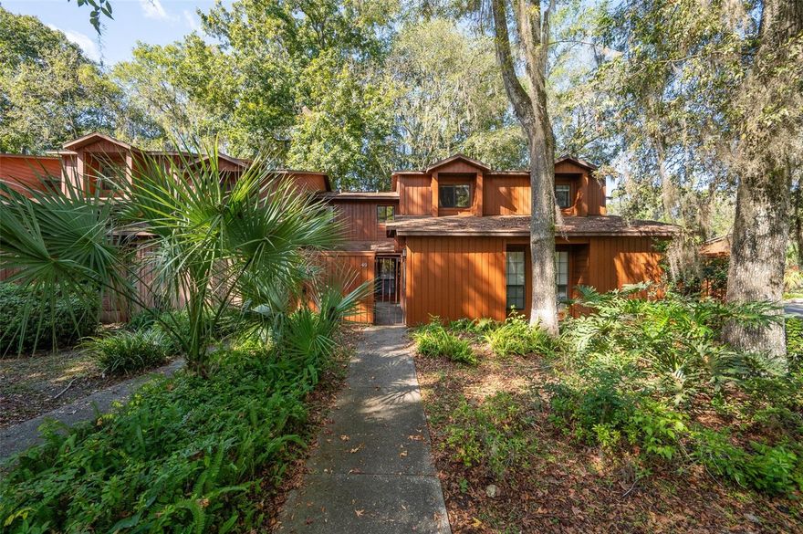 Discover a turn-key opportunity in a prime Gainesville location—just minutes from retail, dining and the University of Florida. With each of the three bedrooms featuring its own full bath, this layout offers rare convenience and privacy, whether for families, roommates or rental investors. Step inside to a fresh, updated interior with modern finishes and easy-care flooring throughout. A gated front courtyard makes an inviting entrance, and a screened-in patio provides the ideal space for relaxing evenings or morning coffee. The open flow from the kitchen into the living and dining areas ensures effortless entertaining. Living here means enjoying the best of both comfort and community: the Rockwood Villas development offers resort-style amenities (including multiple pools, tennis courts and plenty of guest parking) and a low-maintenance lifestyle with HOA taking care of exterior upkeep and landscaping. Conveniently located near major shopping centers, I-75 access and public transit routes, you’re well-connected while tucked away in a well-maintained, private setting. Whether you’re seeking a comfortable everyday home, a down-sized lock-and-leave option, or a high-yield rental asset near UF and Santa Fe College, this home delivers. Don’t miss your chance to own in one of Gainesville’s most sought-after neighborhoods!