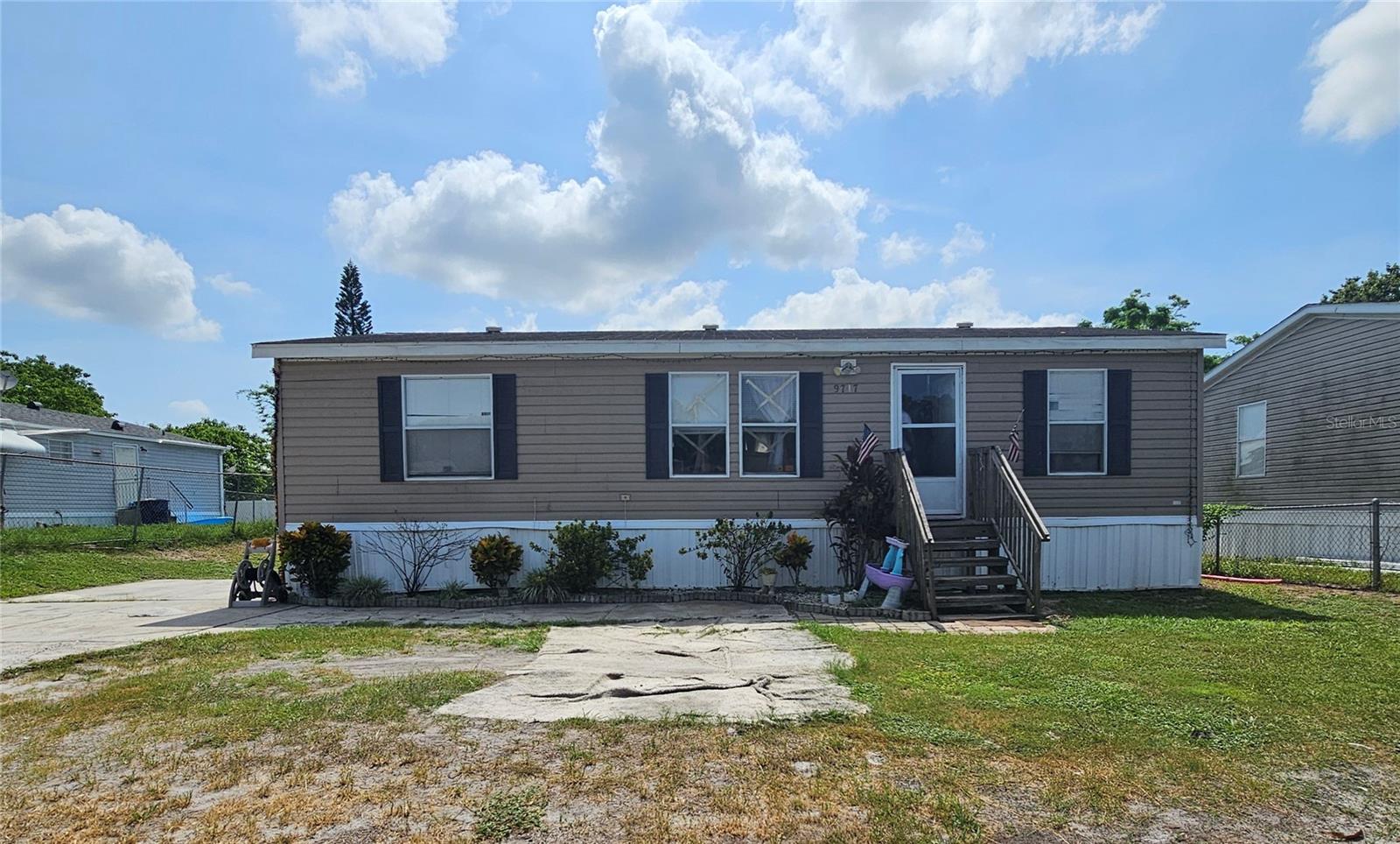 Affordable living in the heart of Orlando! This charming and well-maintained 3-bedroom, 2-bath manufactured home offers 1,080 square feet of comfortable living space with a spacious open layout. Built in 2016, the home features a large kitchen with ample cabinet storage, a split-bedroom floor plan for added privacy, and a generous primary suite with a walk-in closet and private bathroom.
Enjoy a fully fenced yard with ample outdoor space, perfect for entertaining or relaxing. Located in Cypress Park with no HOA fees, this home provides easy access to major highways, shopping, dining, downtown Orlando, and theme parks. Whether you're a first-time buyer, investor, or downsizing, this move-in-ready home offers great value and a central location. Priced to sell!
Schedule your private showing today!