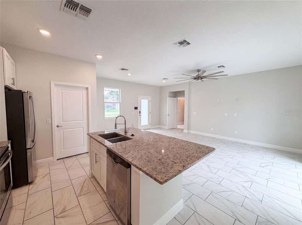 Photo of 1140 Bancroft Street, Deltona, FL 32725 (MLS # O6426502)