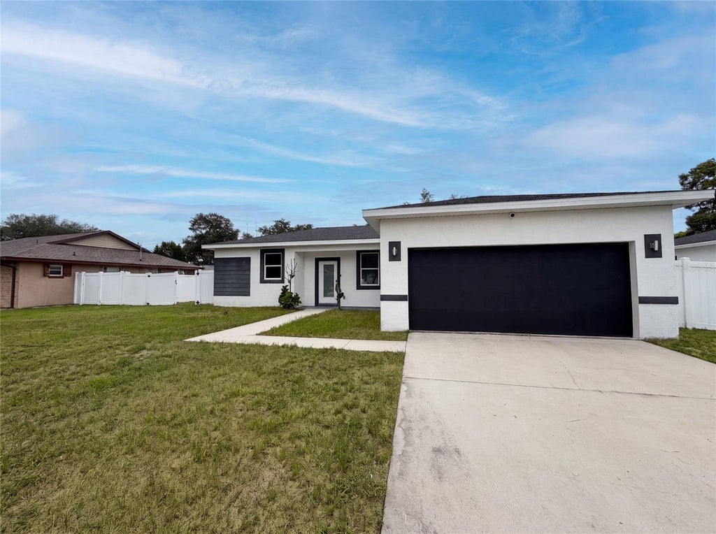 Photo of 1140 Bancroft Street, Deltona, FL 32725 (MLS # O6426502)