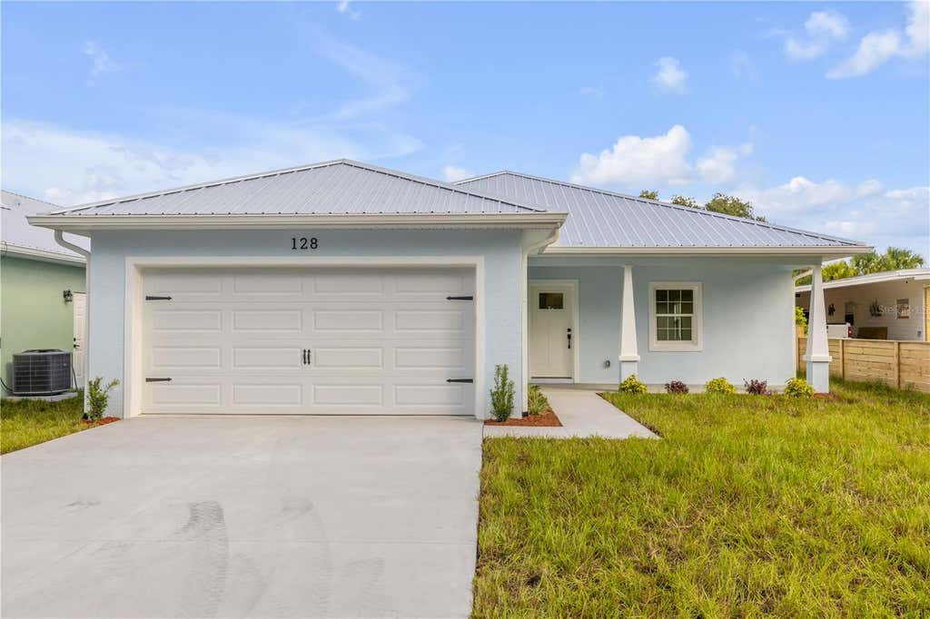 Photo of 128 Indian Creek Road, Oak Hill, FL 32759 (MLS # NS1089103)
