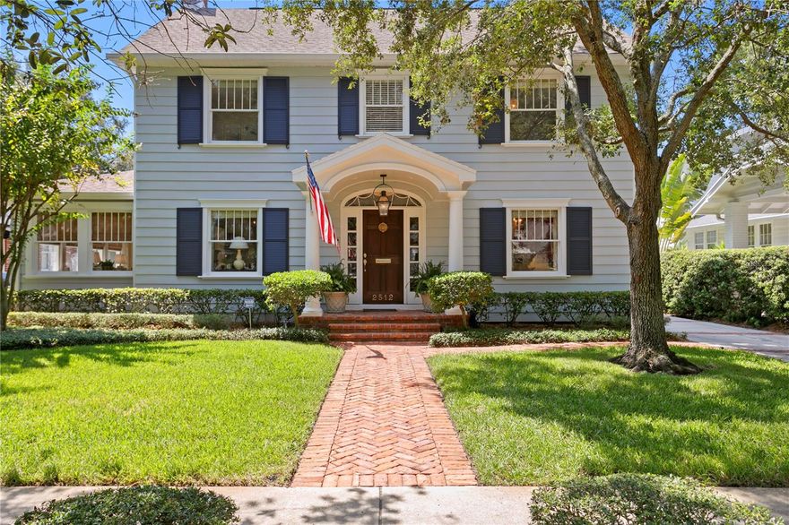 Nestled amongst the oak lined streets of New Suburb Beautiful, this home exudes grace and subtle sophistication. This home's curb appeal is straight out of a storybook with its covered entry and gas Bevolo lantern welcoming you in. As you enter into the home, you immediately feel the history of this home with today’s added touches. Originally built in 1930, this center hall traditional home provides you with all of the perfect spaces for gathering with family and friends. Boasting over 4,800 sq. ft, the main home includes a lovely dining room situated adjacent to the kitchen, a spacious formal living room, a charming Florida sunroom and a cozy family room perfectly adapted for your modern day lifestyle. The kitchen features a Sub-Zero refrigerator & freezer along with a 48" gas stove perfect for the most discerning chef. Downstairs you will also find a functional butler's pantry making your day to day life and your entertaining needs a breeze! The second level of the home contains 5 bedrooms and 3 full baths, 2 of which were recently renovated with the most current trends (Serena & Lilly wallpaper, designer tile & fixtures). The oversized master retreat (21x17) is located at the rear of the home with beautiful vaulted ceilings and views of the spacious backyard. It also features a large walk-in closet and stunning, custom made designer window treatments. On the third level, there is a nearly 400 sq. ft. loft that serves as a great bonus space, kids hangout, office or endless storage. As you travel outside through the French doors off of the family room, you will be amazed by the depth of the backyard (138 ft. deep - plenty of room for a pool!) and the massive garage that easily houses two cars. Inside the garage there is a separate workshop for all of your home improvement projects. The 832 square foot guesthouse above the garage consists of a full kitchen, living room, bedroom with queen size bed, full bathroom and a large closet. It has its own hot water heater and central A/C. The home is zoned for A rated schools that include Mitchell Elementary, Wilson Middle, and Plant High. This home is also located close to Hyde Park Village, Howard Avenue shops, restaurants such as Bern's (walking distance) and bars, downtown, Water Street, the Convention Center, the #2 Riverwalk in the Country, Amalie Arena, and shops and restaurants, and best of all, one block from Bayshore Boulevard. The Tampa airport and Raymond James Stadium are only 15 minutes away.