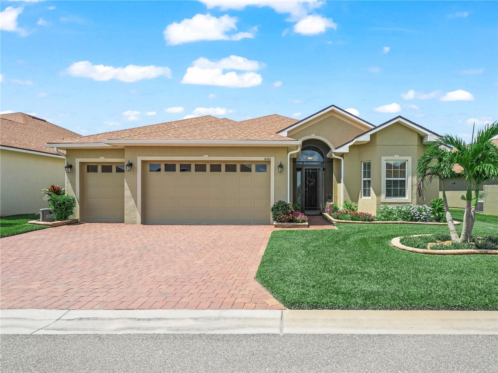 Welcome to this modern residence at 6212 Pinehurst Loop Winter Haven, Fl. 33884, designed with 3 Bedrooms and 2 full bathrooms PLUS an additional room that could be used as a Den/Office. This delightful Sebastian home, with screened entry was BUILT in 2022 and features a spacious living area with abundant natural light, an upgraded kitchen paired with a Large Island (Great for additional seating and entertaining), Upgraded Lighting, Stainless Steel appliances and Silestone countertop. The inviting living and dining areas blend seamlessly together with newly installed carpet. The open-concept layout is beautifully enhanced by new tile plank flooring in the kitchen, laundry, guest bathroom/hall, entry and perimeter of the Living Room, offering a sleek and modern feel. Bedroom 1 and Bedroom 2 are located to the right of the front entry and the guest bathroom with comfort height vanity and shower/tub combo is conveniently located between Bedroom 1 and 2. The guest bath has a glass block above the shower/tub combo. The primary suite with newly installed carpet offers a private retreat on the back of the home, complete with a generously sized bathroom, walk-in closet, separate comfort height vanities, and an oversized shower. Step outside and enjoy the lanai, perfect for entertaining and equipped with an extended birdcage. The flooring on the lanai has been beautifully painted and it adds a touch of class to the space. The laundry room is spacious and is accessible from the garage and kitchen. The garage floor has an epoxy coating. This home blends style and functionality, making it an exceptional choice! The exterior of the home has been well maintained with beautiful landscaped flower beds and the double car garage and the separate golf cart entry is a bonus. Don't miss the opportunity to explore this wonderful property! Lake Ashton is a 55+ community that offers a Florida Retirement Lifestyle with resort style amenities and activities. The main clubhouse offers a movie theater, bowling lanes, grand ballroom, card, craft and billiards, Restaurant (Charm City), outdoor temperature controlled swimming pool, Bocce Courts, tennis courts, 1/2 court basketball, shuffleboard courts and MORE. The Health and Fitness Center has a large indoor temperature controlled pool, fitness center, indoor 1/2 court basketball, indoor racquetball, large multi-purpose room, card, craft, billiards, pickle ball courts and tennis courts. 2 -18 hole golf courses are located in Lake Ashton (memberships are optional). Tour this well maintained home today! You'll be glad you did!