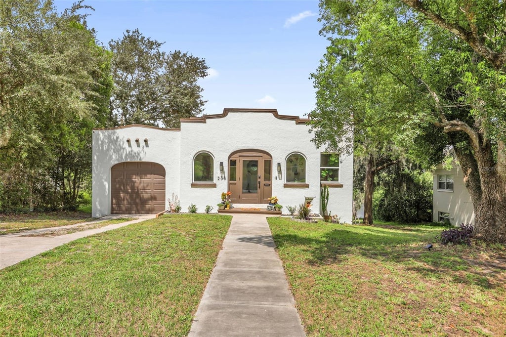 Photo of 235 E Beach Street, Groveland, FL 34736 (MLS # O6435408)