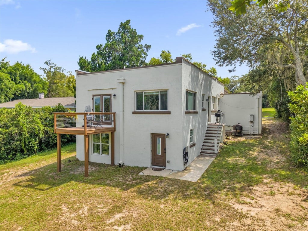 Photo of 235 E Beach Street, Groveland, FL 34736 (MLS # O6435408)