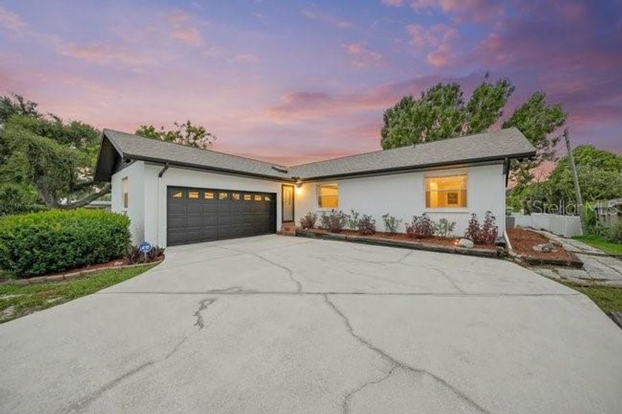 Walk to Siesta Key! | West of the Trail | No HOA

Updated one-story coastal home less than 2 miles to Siesta Key Beach and Little Sarasota Bay, located west of the Trail off Stickney Point Rd. Set on a large, elevated corner lot in a quiet neighborhood with wide streets and minimal traffic.

Block construction with open floor plan and abundant natural light. Recent upgrades include impact windows (2025), new roof (2024), new sliders, luxury Mannington laminate floors, solid wood interior doors, fresh paint, and updated lighting. Oversized 2-car swing garage.

Redesigned kitchen features all new custom soft-close cabinetry, pantry, quartz countertops, stainless appliances, vaulted ceilings, and tiled backsplash—open to living and dining areas. Both bathrooms fully renovated with tiled showers, glass enclosures, and modern finishes.

Enjoy a screened lanai, wood deck, and patio. Water softener, . Close to downtown Sarasota, Southside Village, St. Armands, Lido & Longboat Key. Zoned for Gulf Side Elementary.