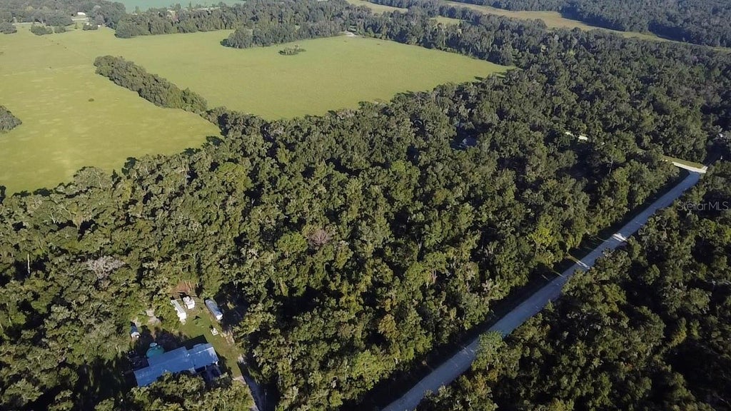 Photo of Tbd NW 48th , Lot 15 Terrace, Chiefland, FL 32626 (MLS # GC543822)