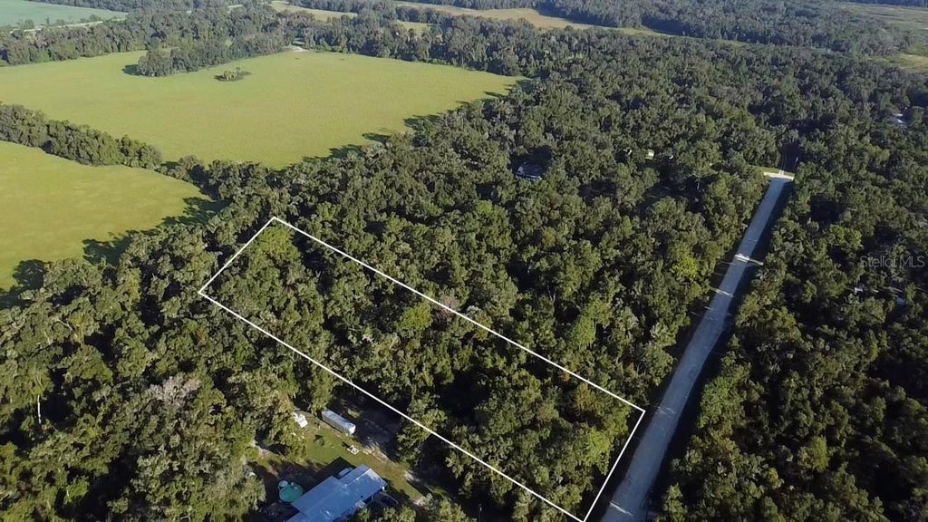 Photo of Tbd NW 48th , Lot 15 Terrace, Chiefland, FL 32626 (MLS # GC543822)