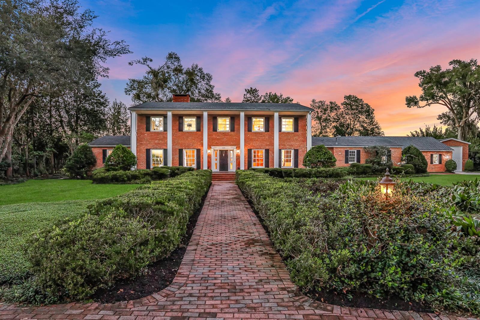 Discover a world of timeless elegance and unparalleled luxury at 900 Pine Tree Terrace in beautiful Deland, Florida. As you approach this exquisite property, you'll immediately realize that you've found something truly exceptional. This stately Georgian-style estate, built in 1968, stands as a testament to classic architecture and modern opulence, and it's ready to welcome you home. Property Highlights: Location: Situated on a sprawling 1.3-acre manicured lot, this estate is a beacon of prestige and exclusivity in the Deland community. You'll be delighted to know that it's conveniently located close to downtown Deland and the esteemed Deland High School, adding to its value and desirability.
Estate Features: This grand residence boasts an impressive array of features, including:
Bedrooms & Bathrooms: With 5 bedrooms and 4.5 bathrooms, your family and guests will enjoy ample space and comfort.
Elegant Interiors: Step inside to find gleaming hardwood floors, custom cabinetry, and marble and granite countertops throughout. The attention to detail is impeccable.
Gourmet Kitchen: For the culinary enthusiast, this kitchen is a dream come true. High-end appliances, including a pot filler and Jenn-Air 6-burner gas stove, set the stage for culinary excellence.
Entertainment Spaces: The home offers not one, not two, but three inviting living rooms, two of which feature cozy fireplaces. The third boasts vaulted ceilings and brick flooring that seamlessly connects indoors to the expansive outdoor space.
Outdoor Oasis: Step outside to your private paradise, featuring a generous 20x40 swimming pool with a state-of-the-art electric cover that opens and closes with ease.
Primary Suite: The primary suite is a retreat of its own, offering 825 sq/ft of space, a separate A/C zone, a spa-like bathroom with marble countertops and flooring, a jetted tub, a walk-in shower, and an enviable 10x14 closet.
Storage and Convenience: A 4-car garage provides ample space for your vehicles, and there's even a class A RV garage custom-built with 30 and 50-amp plugs, ensuring that all your storage needs are met.
This is More Than a Home - It's a Lifestyle:
900 Pine Tree Terrace represents an estate of immense value in the Deland community. It's a haven for those who appreciate the finer things in life, the serenity of a perfectly landscaped estate, and the convenience of a prime location. Don't miss your opportunity to make this luxurious retreat your very own. Contact us today to experience the epitome of upscale living in Deland, Florida. Your dream estate awaits!