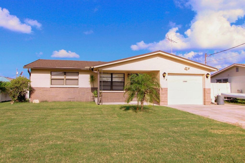 Photo of 13807 Plumosa Avenue, Hudson, FL 34667 (MLS # O6353688)