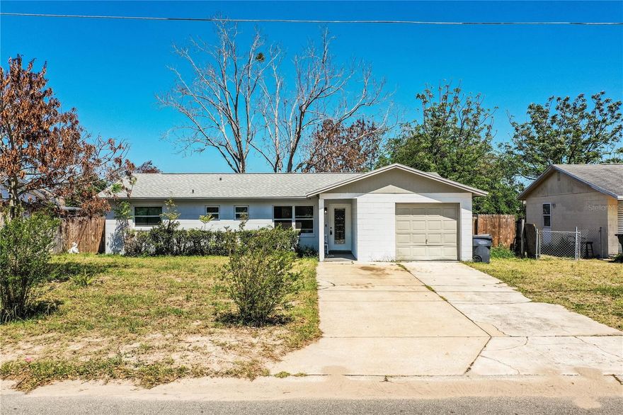 One or more photo(s) has been virtually staged. Short Sale. Welcome to this beautifully updated 4-bedroom, 1.5-bath single-family home located in Winter Haven with NO HOA! This solid block construction home offers peace of mind with a new roof and AC installed in 2024. Inside, you’ll find newer flooring throughout along with a recently renovated kitchen and bathrooms, giving the home a fresh, modern feel.

The kitchen features quartz countertops, stainless steel appliances, and updated cabinetry, perfect for both everyday living and entertaining. The functional layout includes four spacious bedrooms, a full bathroom, and an additional half bath for added convenience.

Enjoy outdoor living in the fully fenced backyard, ideal for pets, gatherings, or simply relaxing in your private space. The home also includes a 1-car garage for storage and parking.

Ideally situated near Lake Conine, part of Winter Haven’s famous Chain of Lakes, this property offers easy access to boating, fishing, and outdoor recreation. Conveniently located near major roadways, providing a quick commute to Orlando, Tampa, and world-renowned attractions like Disney.

This move-in ready home combines modern updates, a great location, and no HOA restrictions—don’t miss your opportunity to make it yours!