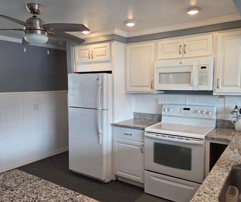 Photo of 605 Michigan Boulevard #118, Dunedin, FL 34698 (MLS # TB8447338)