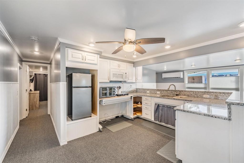 Photo of 605 Michigan Boulevard #118, Dunedin, FL 34698 (MLS # TB8447338)