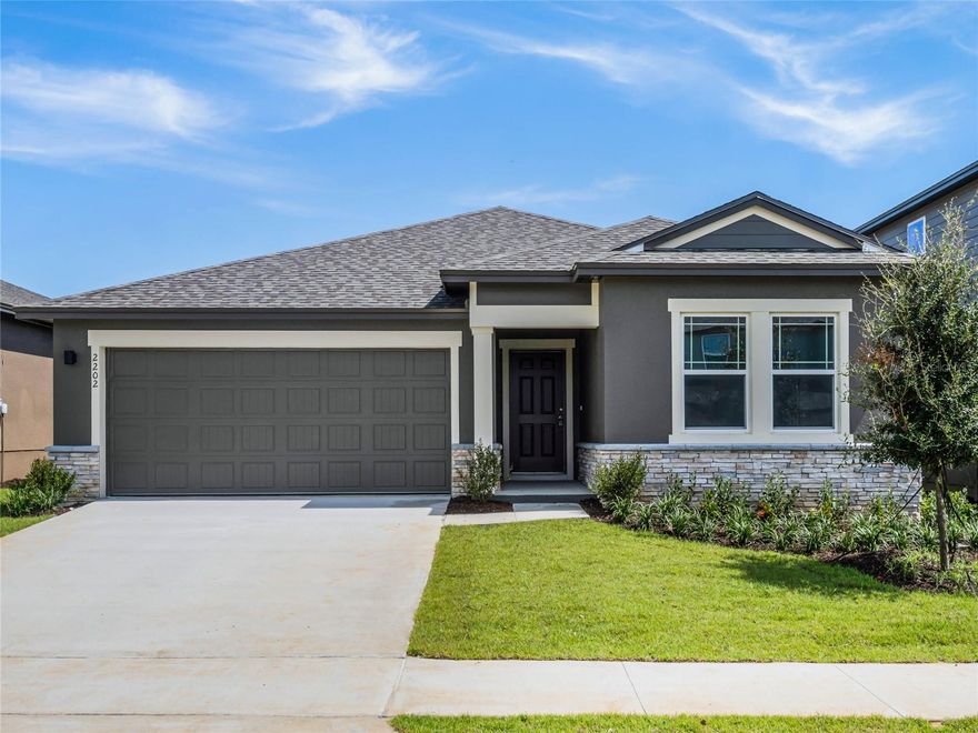This Clermont 3-bedroom, 2-bathroom home offers the perfect blend of style and functionality. Located in the Hills of Minneola right in the center of all the exciting additions coming to the growing town of Minneola. New hospital and elementary school under construction with a town center to built filled with all the retail and restaurants you could desire, all within minutes. Only 2 miles from the Turnpike interchange, providing easy commuting. Step inside to a spacious, open-concept living area flooded with natural light. The modern kitchen features stainless steel appliances and stone countertops. Retreat to the master suite, complete with a private bathroom and large walk-in closet. Two additional bedrooms and a second full bathroom provide comfortable accommodations for family or guests. Enjoy the peace and tranquility of your new oversized backyard, with a private covered back porch, perfect for outdoor relaxation. Washer & dryer and lawn care included.