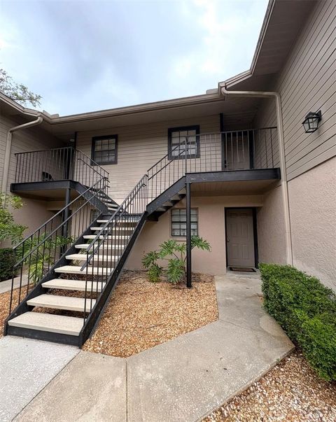 Photo of 4015 Ashford Green Place #D202, Tampa, FL 33613 (MLS # TB8528565)