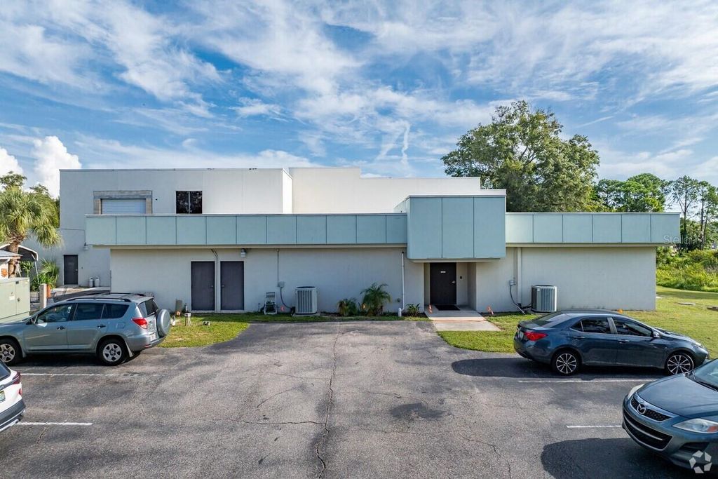 Photo of 2119 Grand Boulevard, Holiday, FL 34690 (MLS # TB8404015)