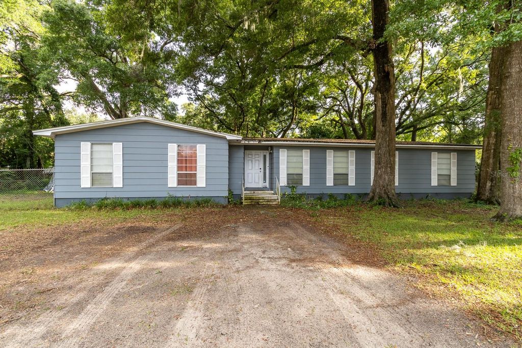 Photo of 14215 NW 142nd Place, Alachua, FL 32615 (MLS # OM721213)