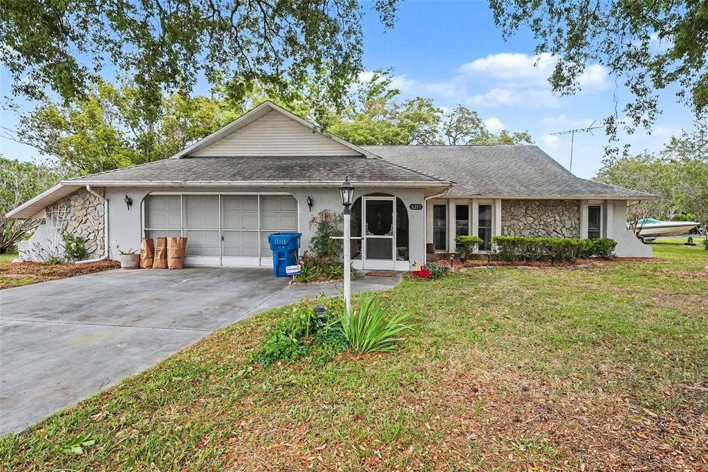 Photo of 8251 Earlshire Lane, Spring Hill, FL 34606 (MLS # TB8500607)