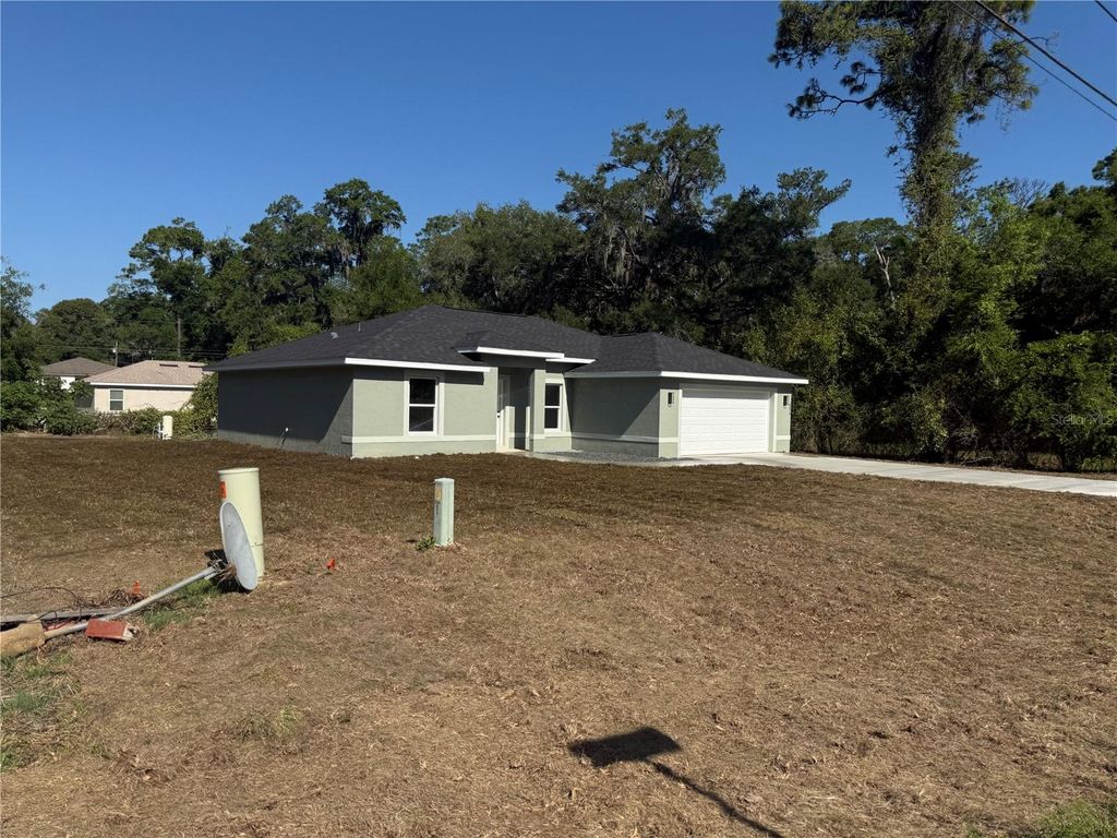 Photo of 6276 NW 62nd Avenue, Ocala, FL 34482 (MLS # OM723539)