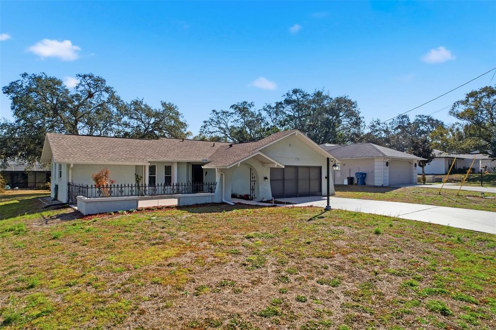 Photo of 1196 Macfarlane Avenue, Spring Hill, FL 34608 (MLS # W7883049)