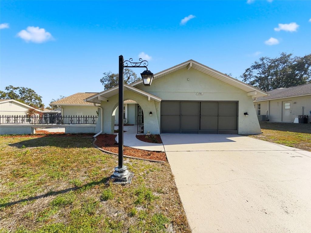 Photo of 1196 Macfarlane Avenue, Spring Hill, FL 34608 (MLS # W7883049)