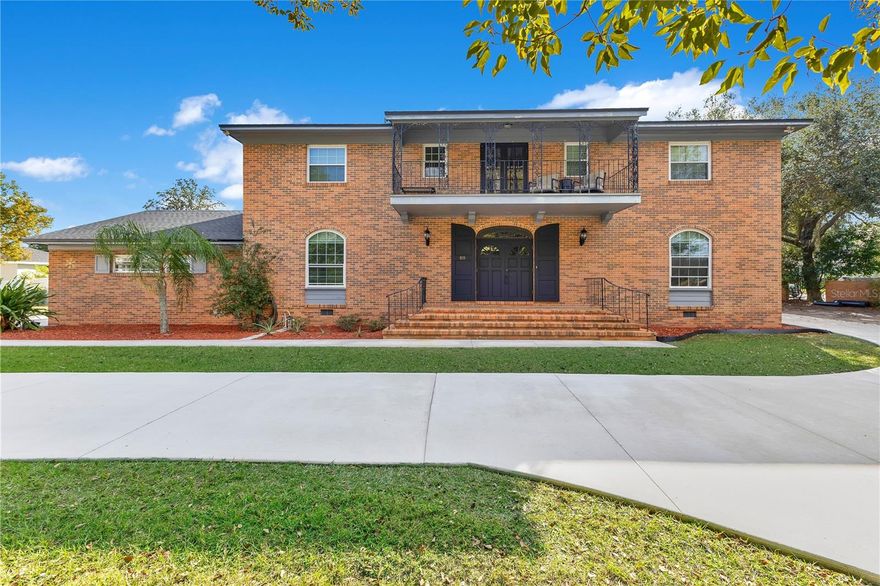 Gracefully positioned on a corner lot at the beginning of a quiet cul-de-sac within a neighborhood offering one-way-in, one-way-out access, this brick-front residence delivers exceptional privacy, a sense of seclusion, and a peaceful living environment rarely found. A welcoming front porch and upper balcony create timeless curb appeal and an elevated first impression.

A thoughtfully designed U-shaped driveway allows effortless access to the front entry or a seamless pull-through into the extra-wide two-car garage, providing outstanding storage and flexibility—with potential to expand or connect to the existing shop/workspace for enhanced functionality.

The backyard unfolds into a true private retreat, featuring a saltwater resort-style pool and hot tub, an air-conditioned enclosed porch ideal for year-round enjoyment, and an attached deck perfect for entertaining or unwinding in tranquil surroundings. Enhancing the property even further is a substantial shop/workspace, ideal for a home-based business, creative studio, gym, or professional-grade remote work setup—separate from the main living space for added convenience and versatility.

Inside, the generously sized bedrooms offer flexibility for modern living, easily accommodating sleeping arrangements alongside dedicated desk or study areas. A wood-burning fireplace adds warmth and character, creating a cozy focal point for gatherings or relaxed evenings at home.

Opportunities that combine corner-lot privacy, controlled neighborhood access, lifestyle amenities, and adaptable spaces are rarely available.
Schedule your private showing to experience what makes this home truly exceptional.